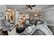 Open-concept living room showcasing a modern kitchen, dining area, and comfortable seating at 7725 Pierpoint Ln, Alpharetta, GA 30005