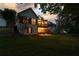 Exterior rear of home with a two-story deck, outdoor seating, and a spacious backyard at 9889 Between The Grns, Villa Rica, GA 30180