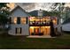 Expansive two-story deck and patio area with comfortable seating, perfect for outdoor entertaining at 9889 Between The Grns, Villa Rica, GA 30180
