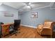 Bedroom with desk and chair area has a ceiling fan and recessed lighting at 9889 Between The Grns, Villa Rica, GA 30180