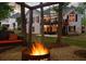 Backyard fire pit and swing set area for outdoor relaxation and entertainment at 9889 Between The Grns, Villa Rica, GA 30180