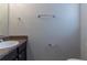 Bathroom featuring granite countertop, sink, and chrome towel bars at 2319 Rambling Way, Lithonia, GA 30058