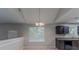 Dining area featuring neutral colors, and modern lighting fixture at 2319 Rambling Way, Lithonia, GA 30058