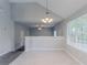 Bright living room with neutral paint, tile flooring, and large windows with natural light at 2319 Rambling Way, Lithonia, GA 30058