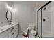 This bathroom features double sinks, a shower, and toilet for a complete and functional space at 5299 Noble Village Way, Lilburn, GA 30047