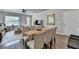 Inviting living and dining room with hardwood floors, stylish furniture, and abundant natural light at 5299 Noble Village Way, Lilburn, GA 30047