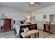 Well-lit main bedroom with a cozy bed, classic furnishings, and neutral tones at 5299 Noble Village Way, Lilburn, GA 30047