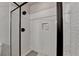 This walk-in shower showcases subway tile, a modern showerhead, and a convenient built-in niche for a spa-like feel at 5299 Noble Village Way, Lilburn, GA 30047