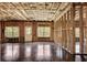 Unfinished basement with exposed framing, concrete floor, and natural light at 208 Idylwilde Way, Canton, GA 30115
