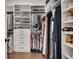 Walk-in closet featuring built-in shelves, hanging rods and plenty of storage at 208 Idylwilde Way, Canton, GA 30115