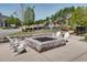 Outdoor fire pit with seating, ideal for social gatherings and relaxation in the community at 208 Idylwilde Way, Canton, GA 30115