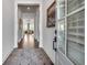 Inviting foyer featuring hardwood floors and an artful rug at 208 Idylwilde Way, Canton, GA 30115