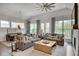 Bright living room featuring cathedral ceiling, large windows, hardwood floors, and neutral tones at 208 Idylwilde Way, Canton, GA 30115