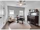 Bright office featuring a ceiling fan, hardwood floors, a neutral rug and lots of natural light at 208 Idylwilde Way, Canton, GA 30115