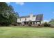 Expansive backyard featuring a deck with multiple gazebos for outdoor enjoyment at 25 Skylar Dr, Covington, GA 30016