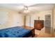 A cozy bedroom with a dresser and two closets at 25 Skylar Dr, Covington, GA 30016