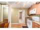 Charming kitchen with wood cabinets, hard surface countertops, and modern appliances at 25 Skylar Dr, Covington, GA 30016