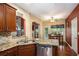 Modern kitchen features granite countertops, stainless steel appliances, and custom cabinetry at 25 Skylar Dr, Covington, GA 30016