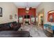 Cozy living room features a fireplace, high ceilings, and lots of natural light at 25 Skylar Dr, Covington, GA 30016