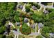 A neighborhood aerial view showcases the property's private, wooded lot in a tranquil suburban setting at 2701 Gentry Dr, Douglasville, GA 30135