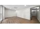 Spacious basement featuring modern gray wood-look flooring, neutral walls, and recessed lighting throughout at 2701 Gentry Dr, Douglasville, GA 30135