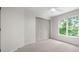 Clean bedroom with ample natural light, carpet, closet and fresh paint at 2701 Gentry Dr, Douglasville, GA 30135