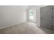 Clean bedroom with ample natural light, carpet and fresh paint at 2701 Gentry Dr, Douglasville, GA 30135