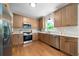 Modern kitchen featuring stainless steel appliances, stylish cabinetry, and hard wood floors at 2701 Gentry Dr, Douglasville, GA 30135