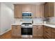 Modern kitchen featuring stainless steel appliances and stylish cabinetry at 2701 Gentry Dr, Douglasville, GA 30135