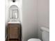 Charming powder room featuring a stylish sink and toilet at 2701 Gentry Dr, Douglasville, GA 30135