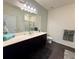 Bathroom featuring a vanity and a large mirror at 3785 Newbury Place Dr, Loganville, GA 30052