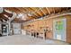 Workshop in garage featuring tools, exposed ceiling and air ducting at 405 Maple Rdg, White, GA 30184