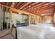 Unfinished basement with exposed ceiling beams and studs, ready for customization at 6375 Haystack Ct, Cumming, GA 30040