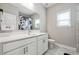 This bathroom features a white marble floor and vanity cabinet at 6375 Haystack Ct, Cumming, GA 30040