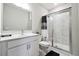 Modern bathroom with glass-enclosed shower and stylish vanity at 6375 Haystack Ct, Cumming, GA 30040