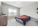 Cozy bedroom offers natural light and plenty of space at 6375 Haystack Ct, Cumming, GA 30040