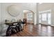 Chic entryway featuring a console table with elegant decor and wood-look flooring at 6375 Haystack Ct, Cumming, GA 30040