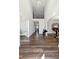Stunning foyer with grand ceilings, hardwood floors, and open staircase leading to the upper level at 6375 Haystack Ct, Cumming, GA 30040