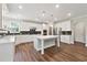 Spacious kitchen features stainless appliances, a center island, and plenty of counter space at 6375 Haystack Ct, Cumming, GA 30040