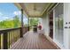 Outdoor deck with ceiling fan and grill at 6375 Haystack Ct, Cumming, GA 30040