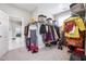 Bright walk-in closet with custom shelving and ample storage space for clothes, shoes, and accessories at 6375 Haystack Ct, Cumming, GA 30040
