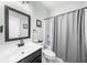 Bathroom with large vanity mirror and shower with tub features neutral wall color and flooring at 100 Inspiration Ln, Dallas, GA 30157