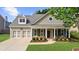 Beautiful home with manicured front yard, two-car garage, and inviting entrance at 100 Inspiration Ln, Dallas, GA 30157