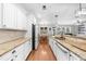 Spacious kitchen with white cabinets, granite countertops, and stainless steel appliances at 100 Inspiration Ln, Dallas, GA 30157