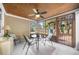 Cozy sunroom overlooking a backyard with a playset, perfect for relaxing and entertaining at 100 Inspiration Ln, Dallas, GA 30157