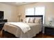Bright bedroom features a comfortable bed and dark furniture set at 1676 Northridge Dr, Morrow, GA 30260
