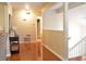 Inviting entryway featuring hardwood floors, light-colored walls, staircase, and neutral decor at 1676 Northridge Dr, Morrow, GA 30260