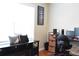 Well-organized office space with desk, storage, and natural light from a window at 1676 Northridge Dr, Morrow, GA 30260