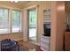 Bright sun room with multiple windows, access to outdoor deck and room to exercise at 1676 Northridge Dr, Morrow, GA 30260