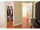 Walk-in closet with shelving and racks visible from bedroom door at 1676 Northridge Dr, Morrow, GA 30260